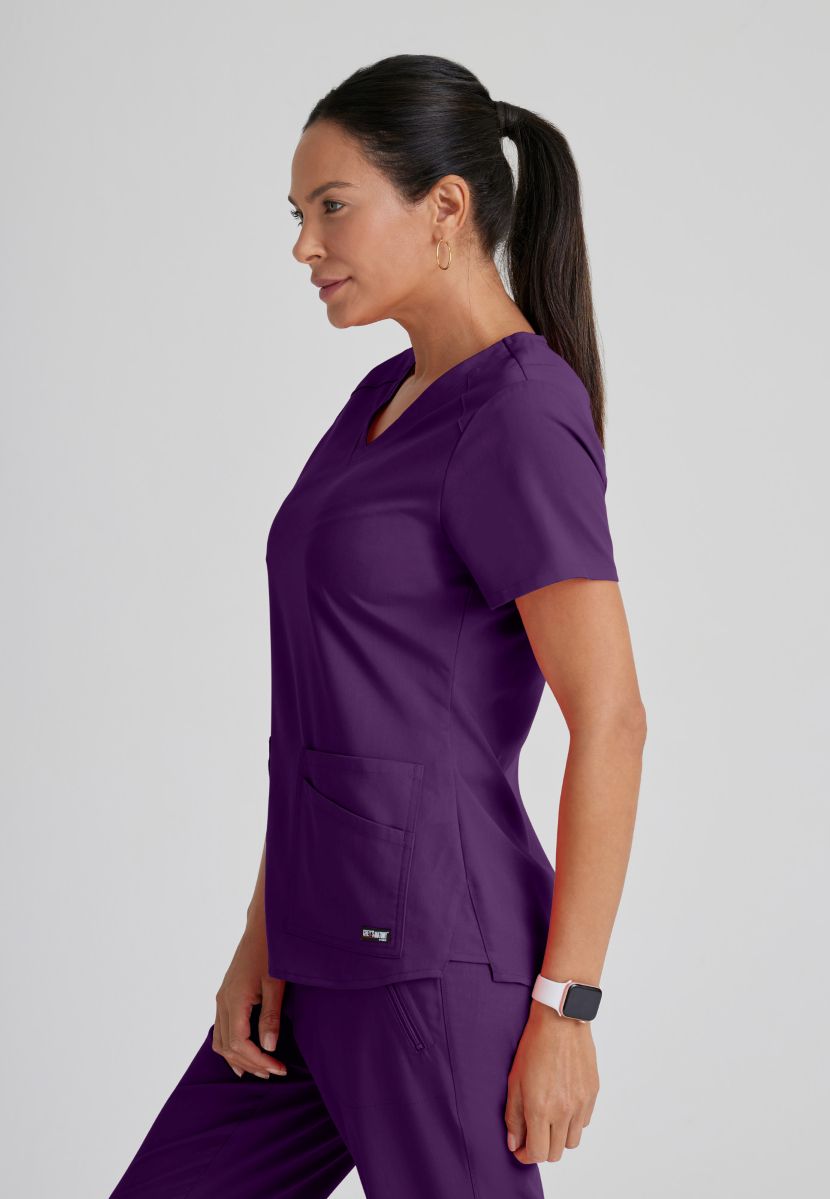 Greys Anatomy Emma 4 pocket, V-neck scrub top with angled seams | Eggplant