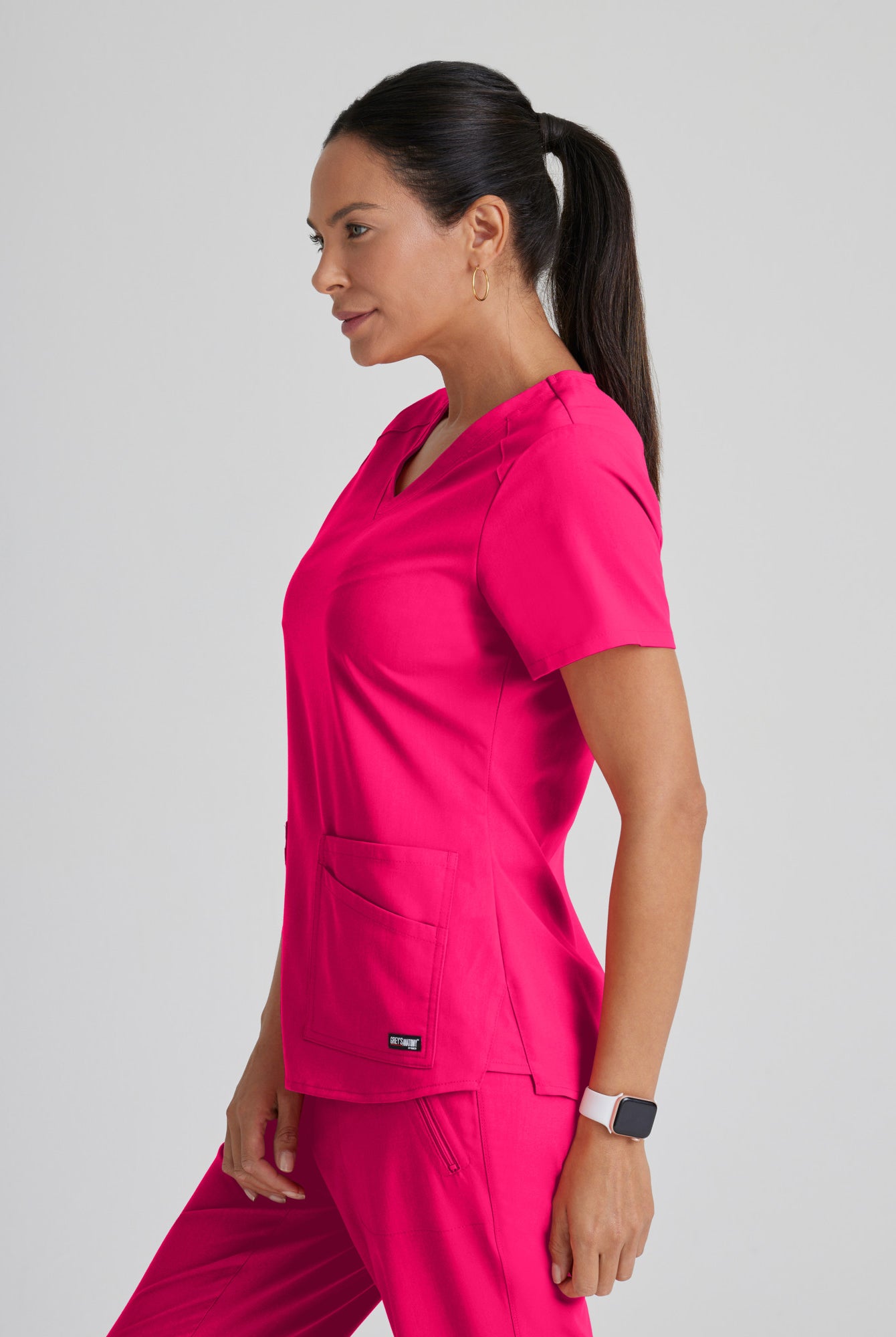 Greys Anatomy Emma 4 pocket, V-neck scrub top with angled seams | VIBRANCE PINK