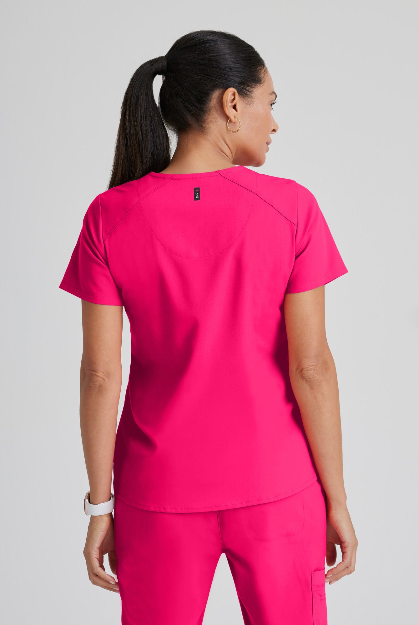 Greys Anatomy Emma 4 pocket, V-neck scrub top with angled seams | VIBRANCE PINK