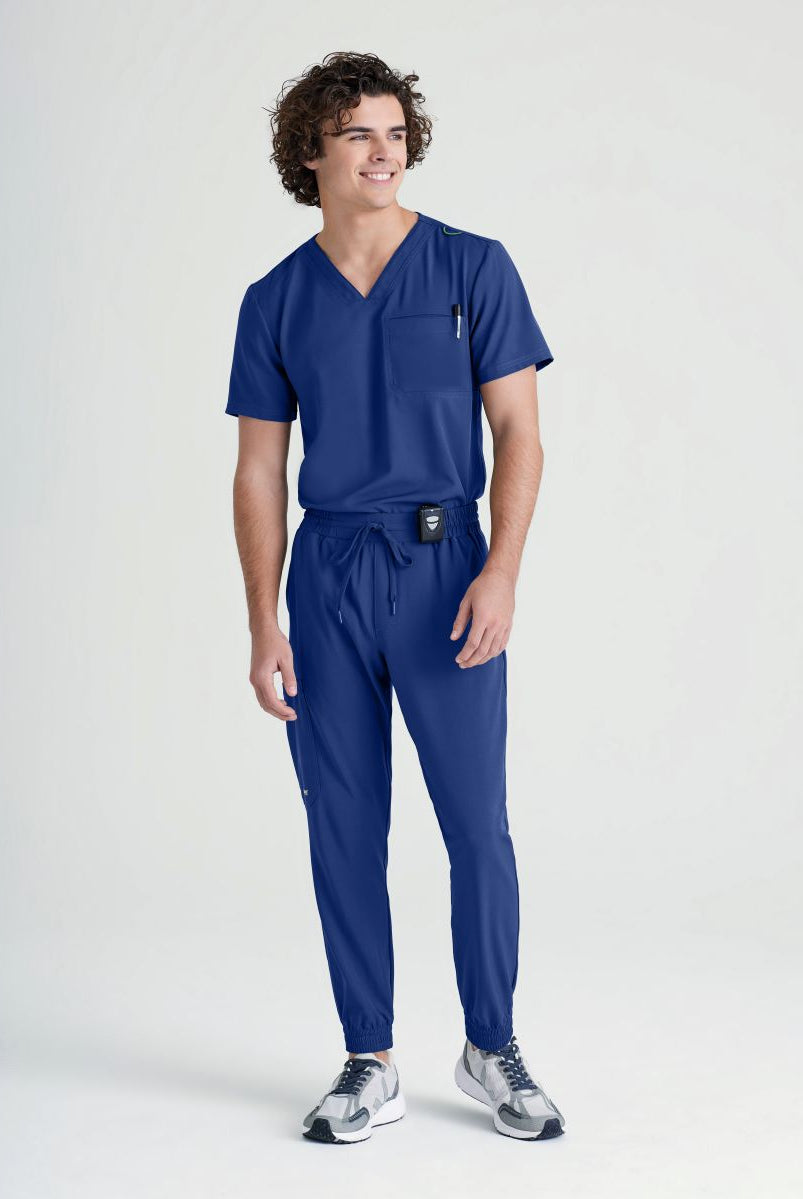 Grey's Anatomy Evolve Piped V-Neck Male Top | NAVY