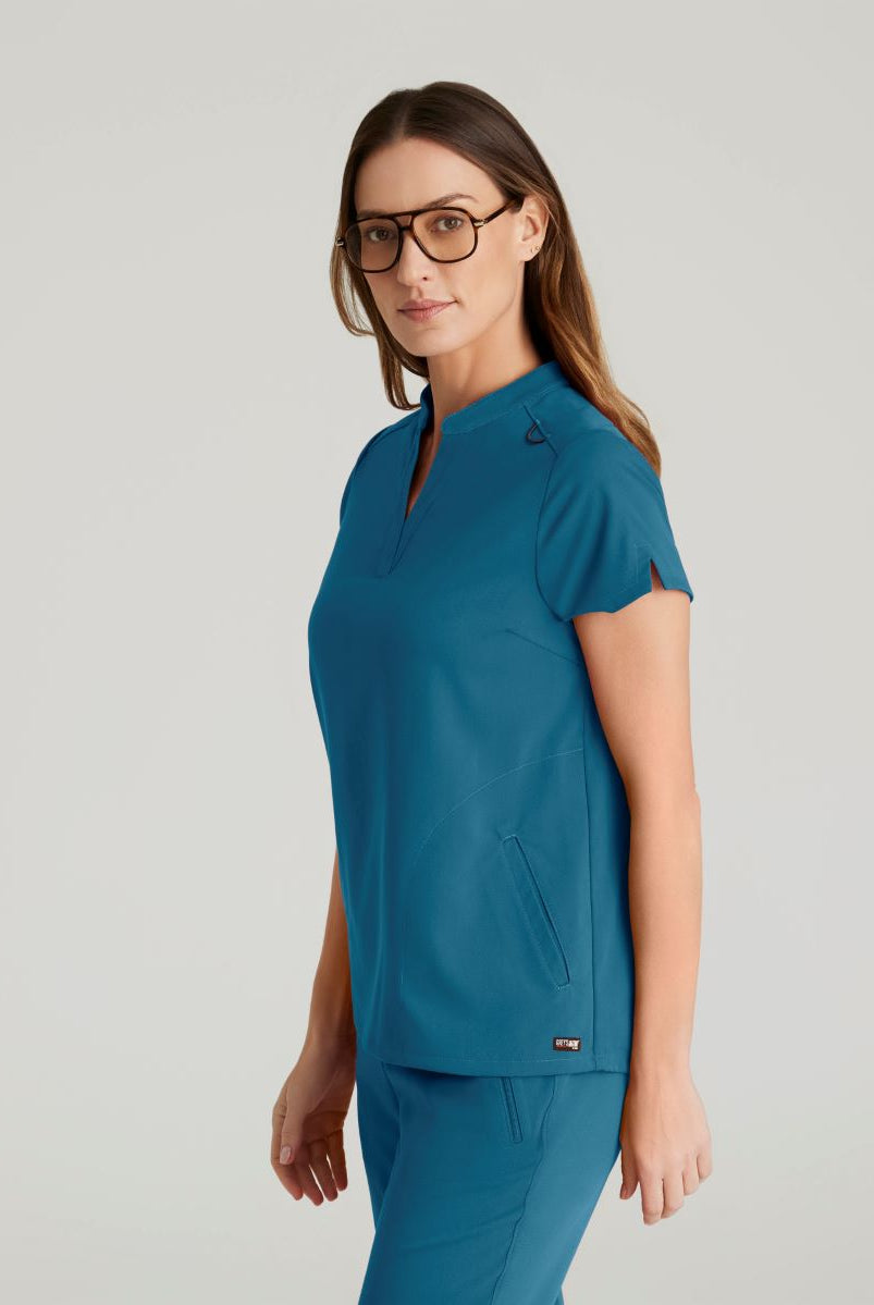 Grey's Anatomy Avery 2 Pocket Banded Collar Top | Bahama / Caribbean