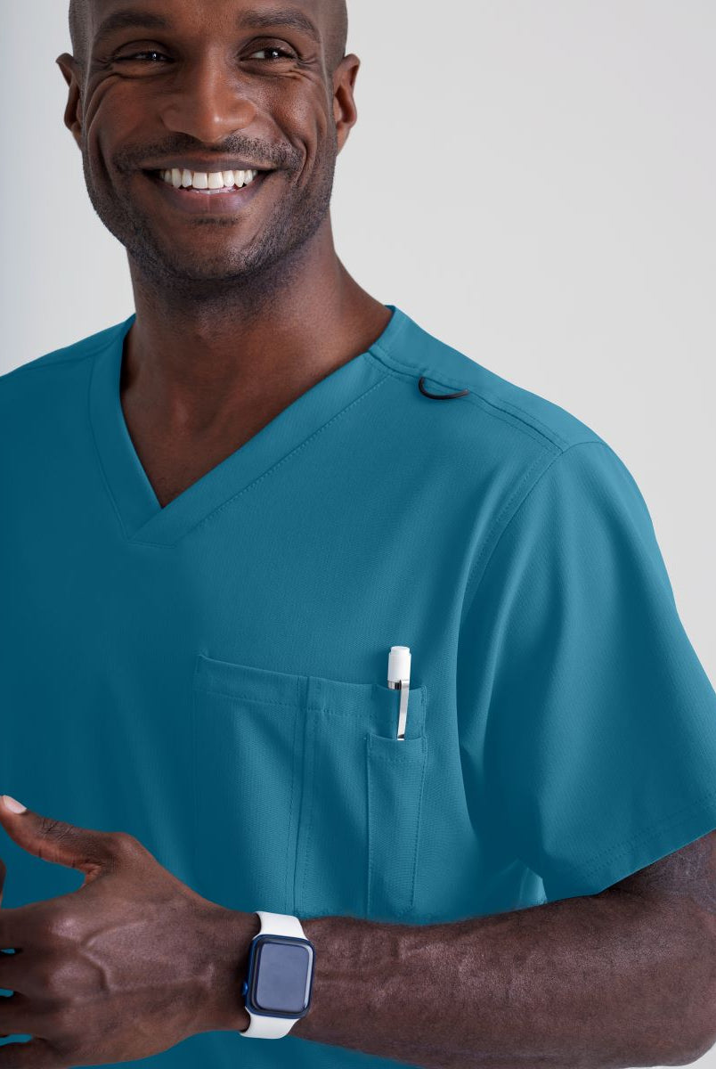 SKECHERS MALE STRUCTURE V-NECK TOP | Bahama / Caribbean