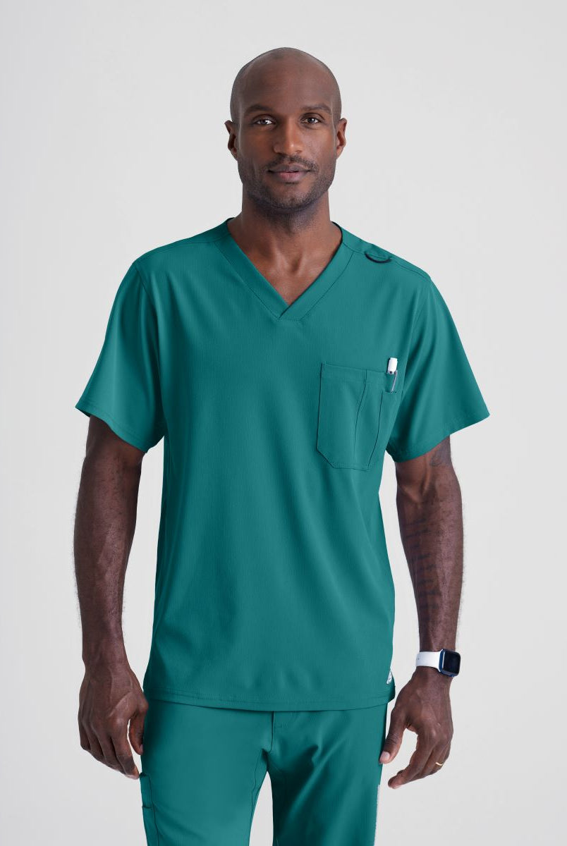 SKECHERS MALE STRUCTURE V-NECK TOP | Teal