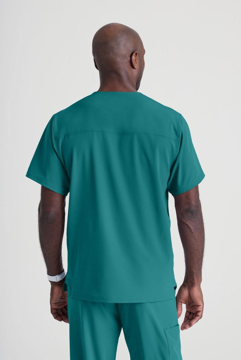SKECHERS MALE STRUCTURE V-NECK TOP | Teal