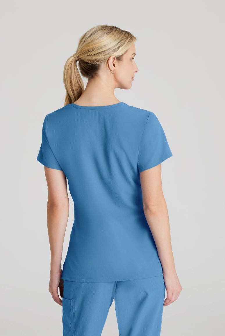 SKECHERS FEMALE RELIANCE 3-POCKET WRAP EFFECT TOP | TRUE CEIL