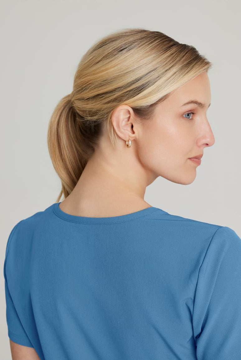 SKECHERS FEMALE RELIANCE 3-POCKET WRAP EFFECT TOP | TRUE CEIL