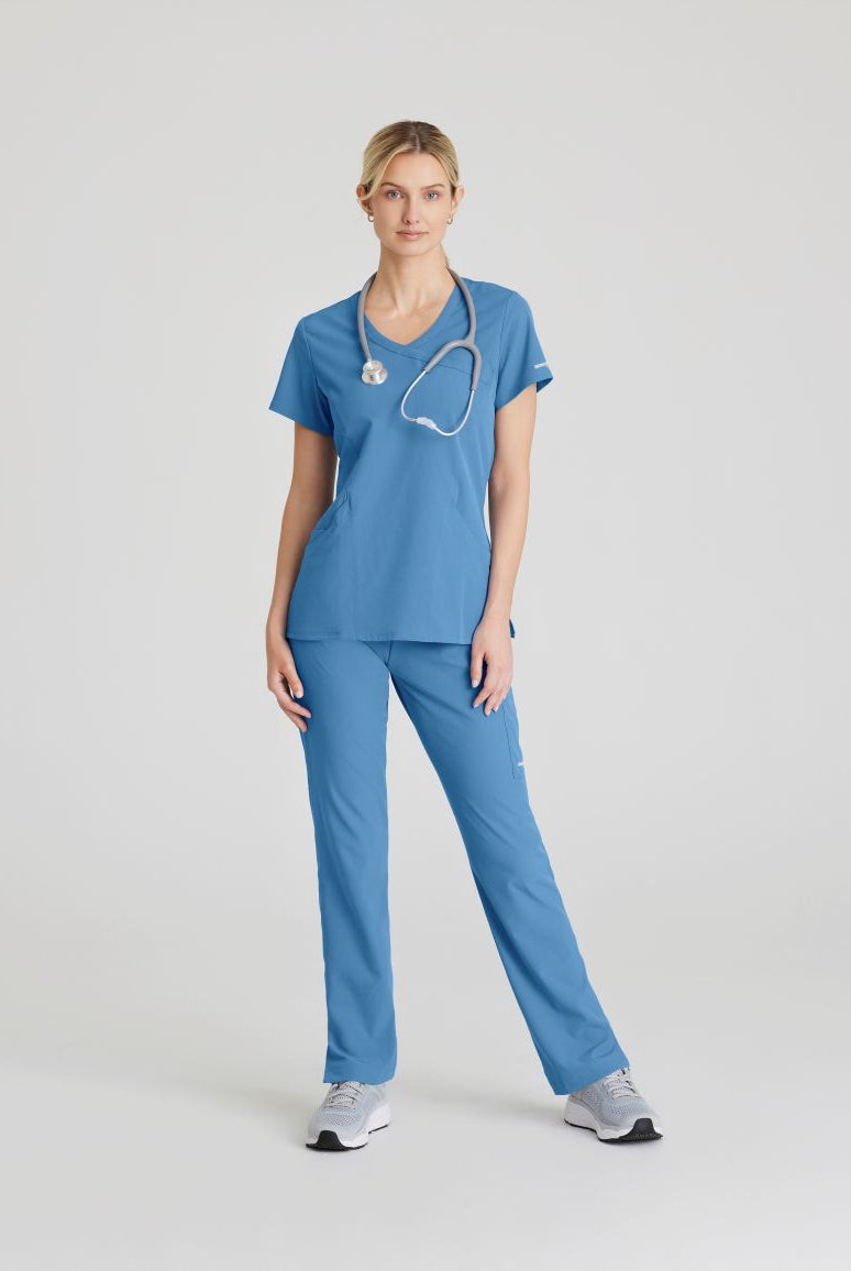 SKECHERS FEMALE RELIANCE 3-POCKET WRAP EFFECT TOP | TRUE CEIL