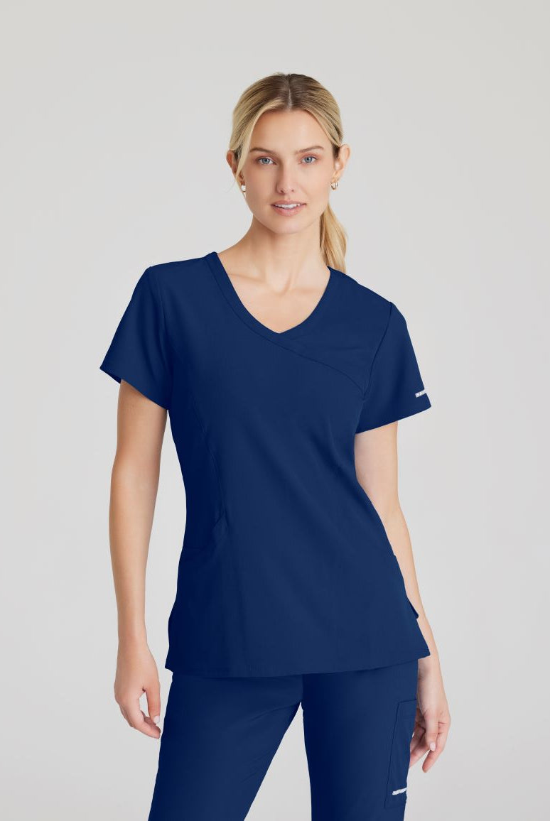SKECHERS FEMALE RELIANCE 3-POCKET WRAP EFFECT TOP | NAVY