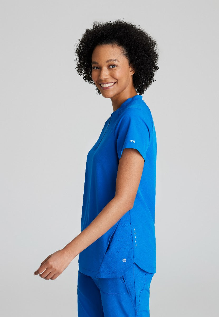 BARCO ONE FLUX FEMALE SCRUB TOP | New Royal