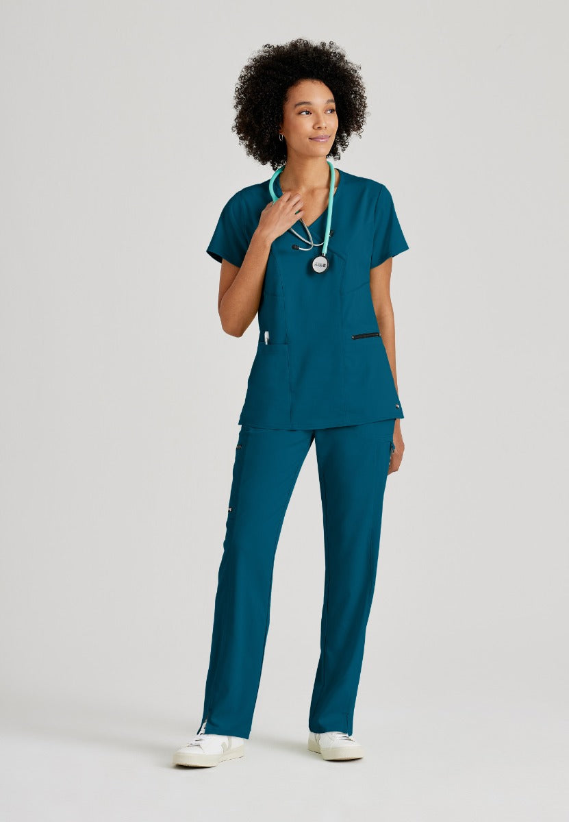 Greys Anatomy V-Neck Kim Top with Zip Front Pocket | Bahama / Caribbean