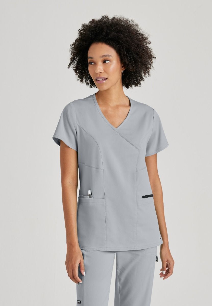 Greys Anatomy V-Neck Kim Top with Zip Front Pocket | Moonstruck