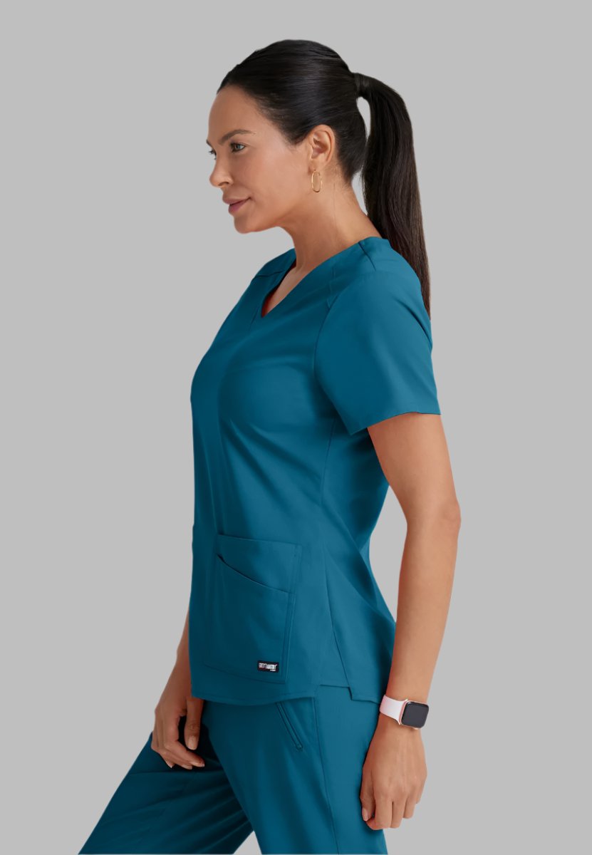 Greys Anatomy Emma 4 pocket, V-neck scrub top with angled seams | Bahama / Caribbean