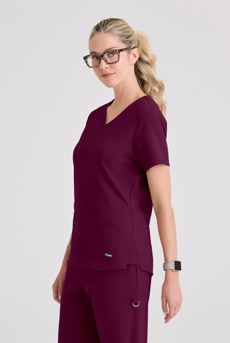 Greys Anatomy Emma 4 pocket, V-neck scrub top with angled seams | Wine