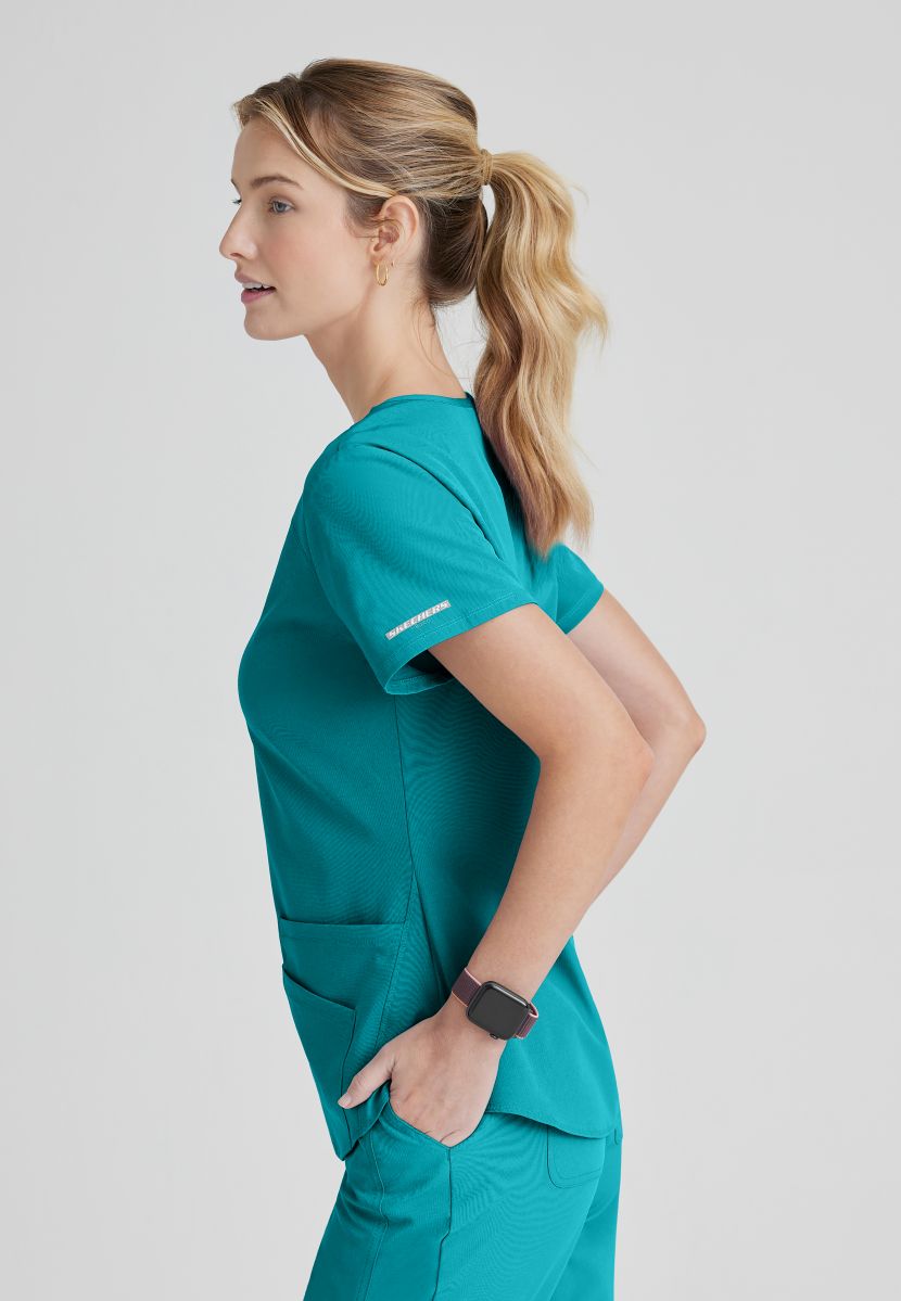 SKECHERS BREEZE 3-POCKET SHAPED HEM TOP | Teal