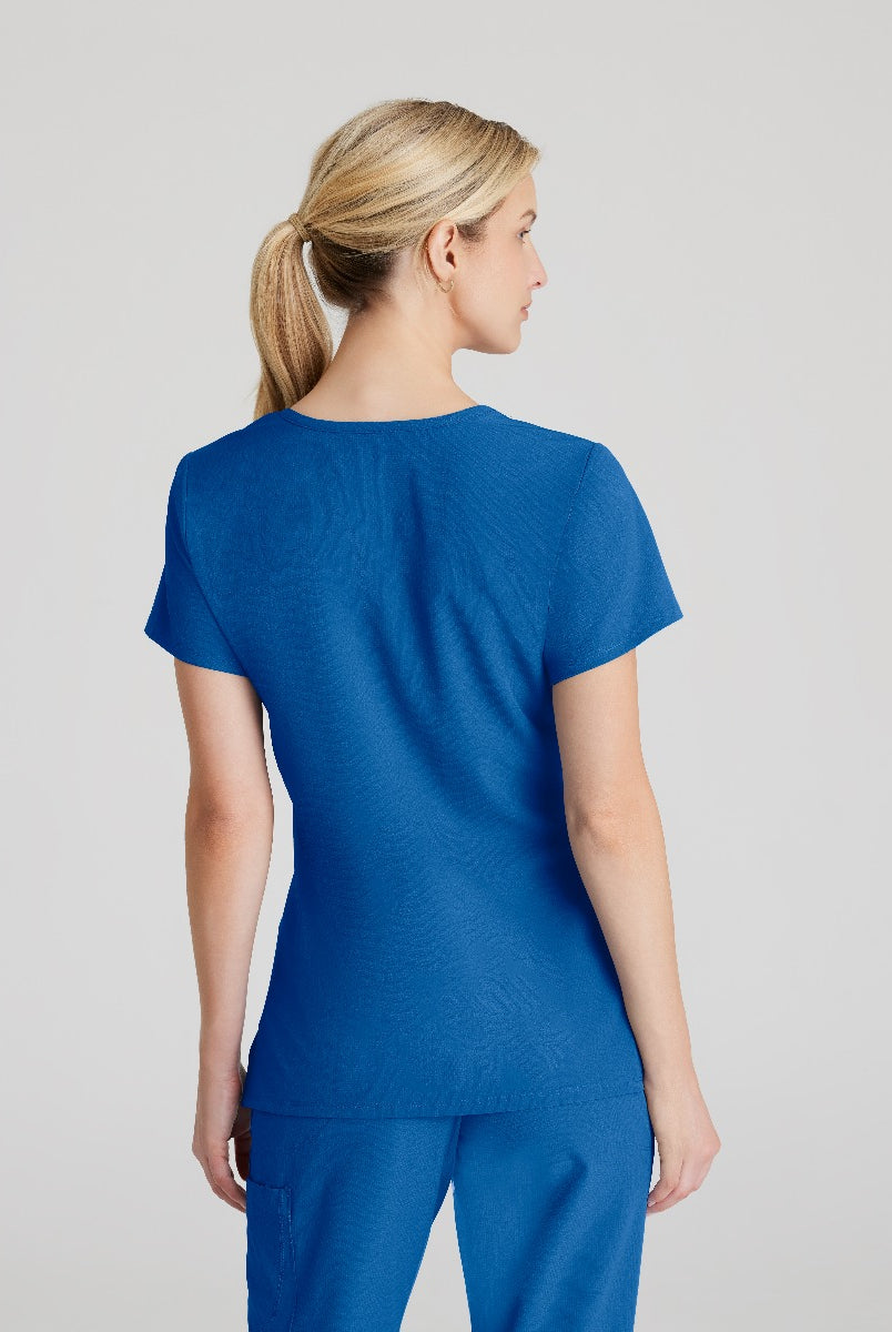 SKECHERS FEMALE RELIANCE 3-POCKET WRAP EFFECT TOP | New Royal