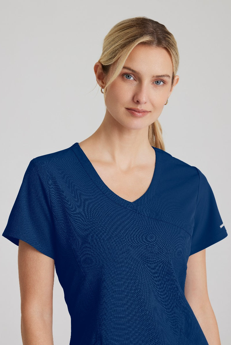 SKECHERS FEMALE RELIANCE 3-POCKET WRAP EFFECT TOP | NAVY