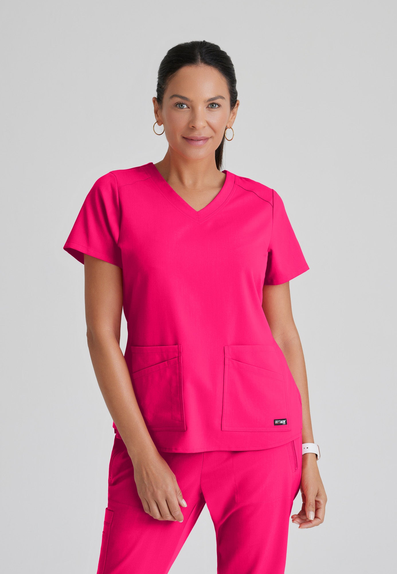 Greys Anatomy Emma 4 pocket, V-neck scrub top with angled seams | VIBRANCE PINK
