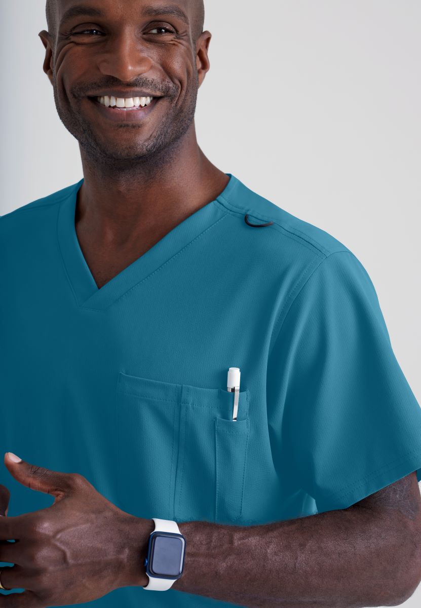 SKECHERS MALE STRUCTURE V-NECK TOP | Bahama / Caribbean