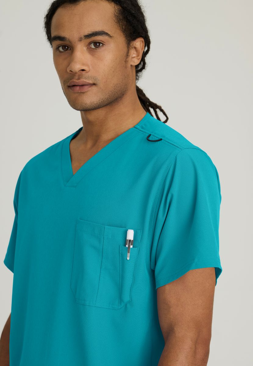 SKECHERS MALE STRUCTURE V-NECK TOP | Teal