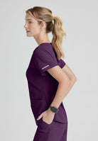 SKECHERS BREEZE 3-POCKET SHAPED HEM TOP | Eggplant