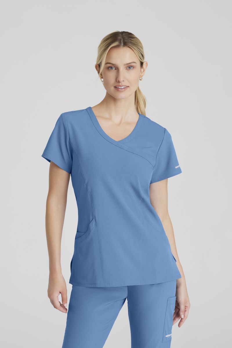 SKECHERS FEMALE RELIANCE 3-POCKET WRAP EFFECT TOP | TRUE CEIL