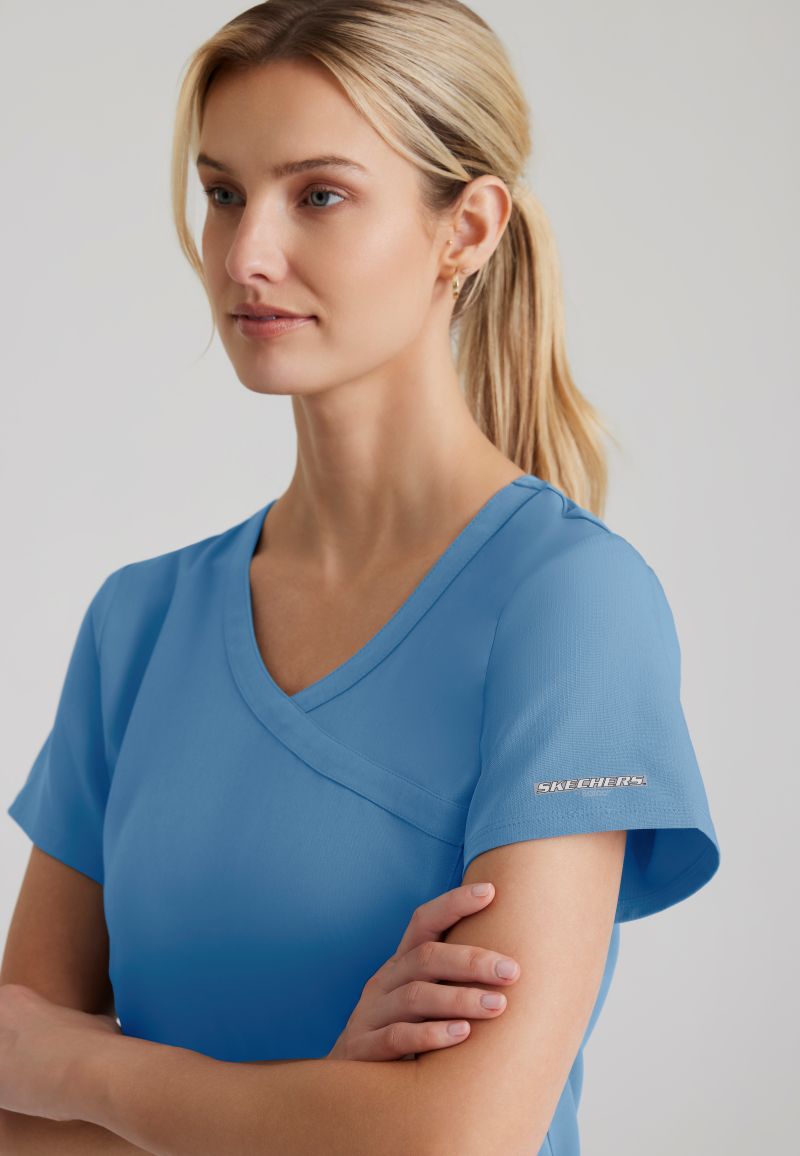 SKECHERS FEMALE RELIANCE 3-POCKET WRAP EFFECT TOP | TRUE CEIL