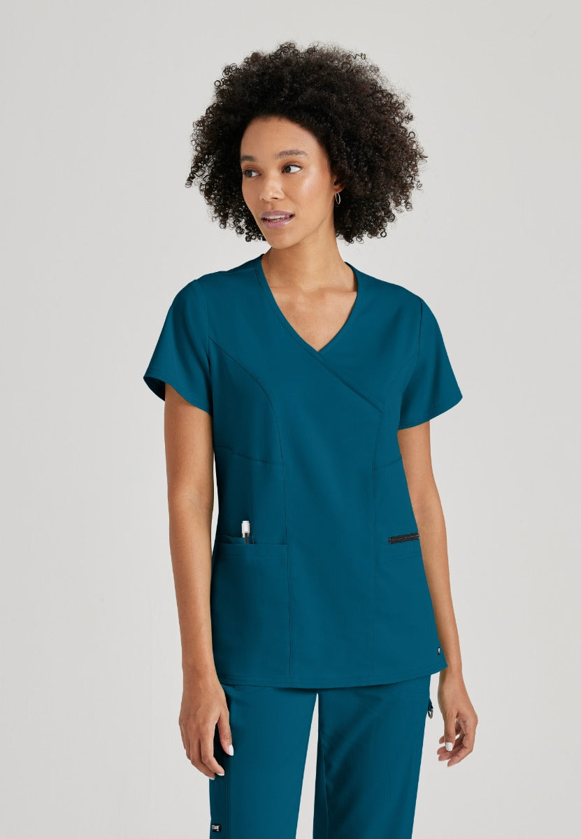 Greys Anatomy V-Neck Kim Top with Zip Front Pocket | Bahama / Caribbean