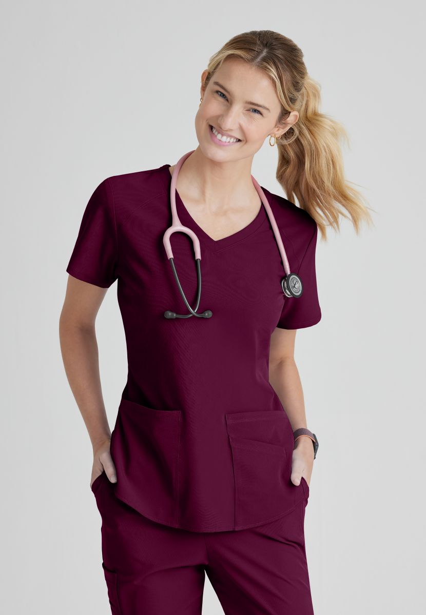 SKECHERS BREEZE 3-POCKET SHAPED HEM TOP | Wine